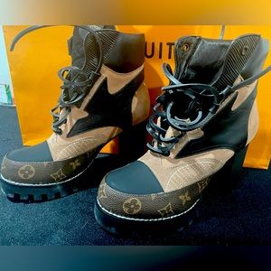 Louis Vuitton
Patent leather biker boots